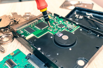 old broken hard disk drives composition in a repair recovery service concept close up selective focus
