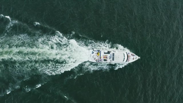 Aerial drone shot over speed boat. Vacation holiday concept. Yacht party.