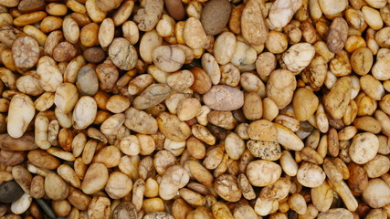 brown pebble stone background, stone texture
