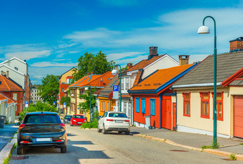 Colorful houses on a street in Oslo, Norway. Traditional Nordic wooden architecture