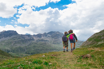 Two children during a summer camp in the mountains