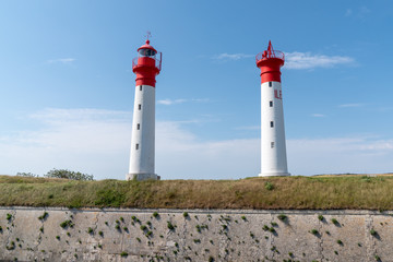 two red and white lighthouses on the island of Ile d Aix in west France