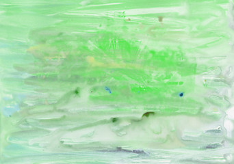 Fototapeta na wymiar Green watercolor splash background. Paint stains with spots, blots, grains, splashes. Colorful wallpaper.