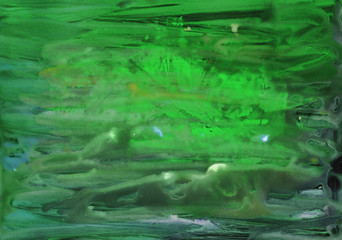 Green watercolor splash background. Paint stains with spots, blots, grains, splashes. Colorful acrylic wallpaper.