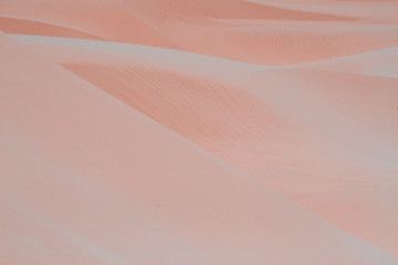 Blurred pink sand dunes background. Desert. Sand background