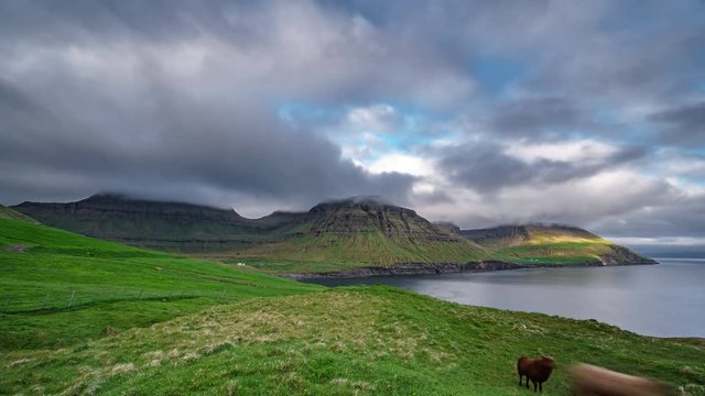 Steep coastline in Faroe Islands, time lapse