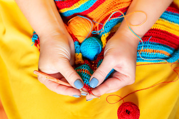 Women's hands crochet. Handmade, crafts.