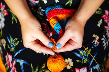 Women's hands crochet. Handmade, crafts.