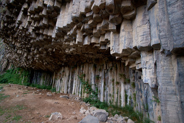 Mountain basalt formations in the form of hexagonal columns, a unique geological formation.