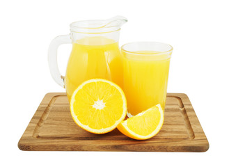 Full glass and jar of orange juice on wooden board isolated on white 