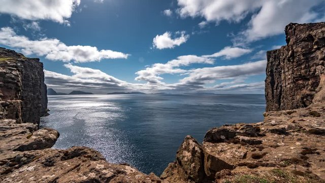 Sorvagsvatn lake rocks over the ocean time lapse, Faroe Islands