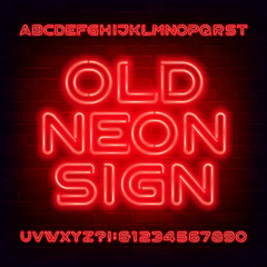 Old Neon Sign alphabet font. Orange light bulb letters and numbers. Stock vector typescript for your typography design. Dark brick wall background.