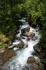 Fototapeta premium Mountain river landscape in pyrenees, powerful stream of mountain river running down the valley in summer Andorra