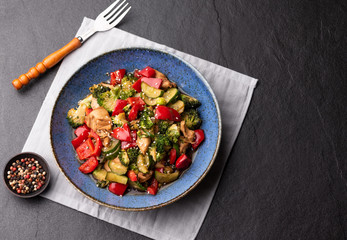 vegetable stir fried on blue plate 