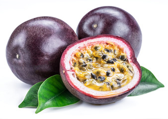 Passion fruits and its cross section with pulpy juice filled with seeds. White background.