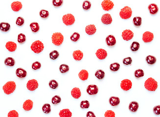  raspberries and cherries on a white background. berry pattern