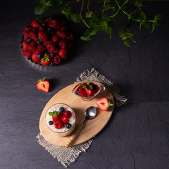 delicious milk rice with different berries and red fruit jelly