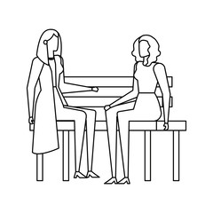 elegant businesswomen seated in the park chair