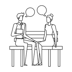 business couple seated in the park chair with speech bubbles