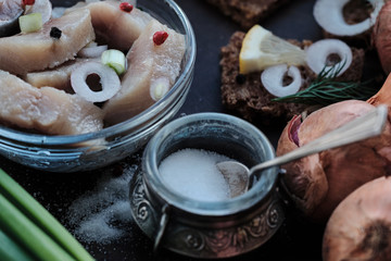 Scandinavian food herring with onion and brown bread