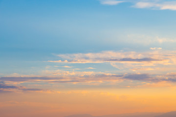 Pink vanilla heaven. Bright blue sky with gentle cumulus clouds. soft pastel colors