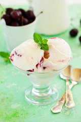Homemade ice cream with cherry and amaretto.