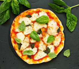 Homemade pizza margarita. Selective focus.