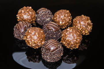 Chocolate pralines background celebrating easter