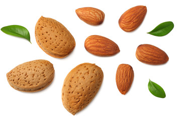 almonds with green leaves isolated on white background. top view.