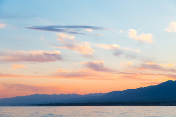 Fototapeta premium sky sunset sea. Beautiful clouds, soft colors. Natural background