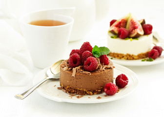 Delicious New York Chocolate Cheesecake with Raspberries. close-up.