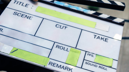Film production crew, close up of movie Clapper board