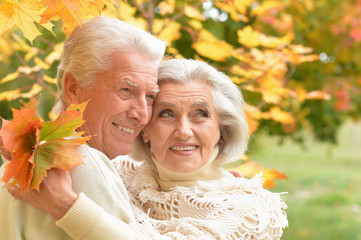 Portrait of beautiful senior couple relaxing in the park