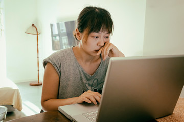 woman using her computer