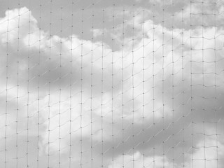 net of fence with cloud sky background black and white style