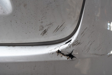 damaged rear plastic bumper from car accident
