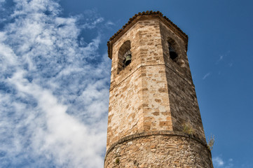 Old stone bell tower and bell in the church.  Architecture details