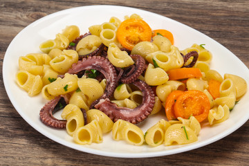 Pasta with octopus and yellow tomatoes