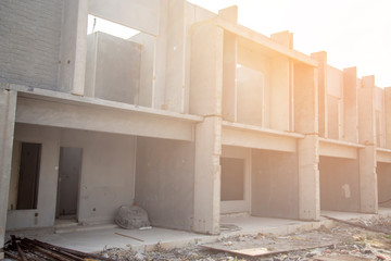 The structure of the house is not finished yet. Residential condominium construction site.