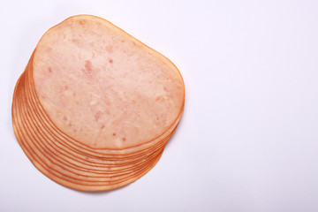 Smoked slices ham isolated on white with copy space