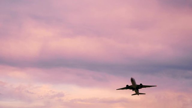 Airplane Take off Sochi at sunset or sunrise
