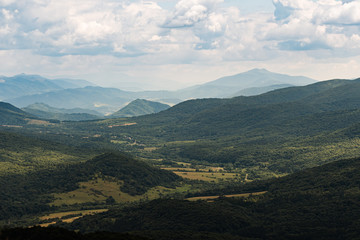 Obraz na płótnie Canvas A view of the valley in Bieszczady Mountains, seen from Połonina Caryńska.