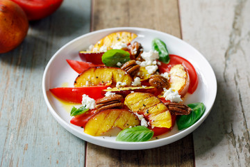 Grilled peach and heritage tomato salad