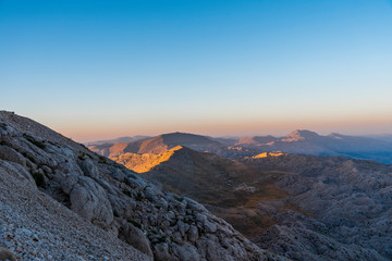 Beautiful landscape, golden sunset over the mountains. View from Nemrut Mountain, Turkey.