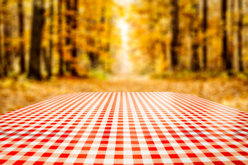 Autumn garden view with the table top background for an advertising product and decoration.