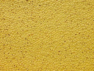 Fototapeta premium gold paint plastic foam texture