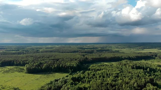 Beautiful summer landscapes with forest and sky. Quadrocopter aerial photography