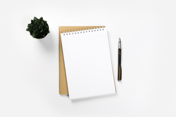 school notebook on a white background, spiral notepad on a table.