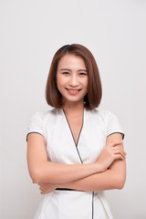 Smiling asian business woman on white background