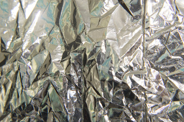 Crumpled metal foil background